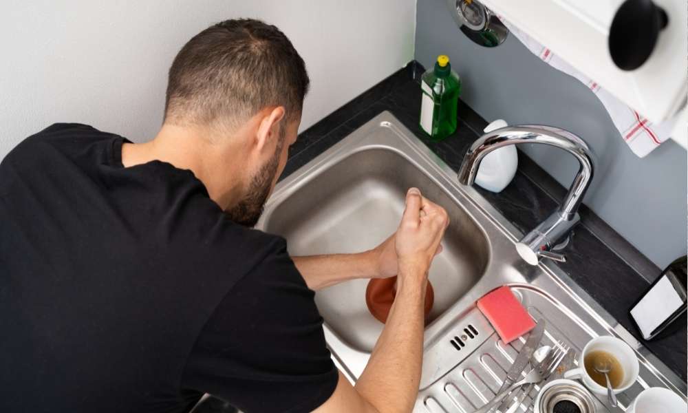 removing old bathroom sink drain